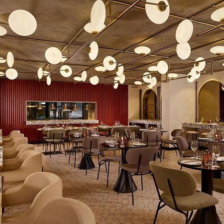 เอ็ม บาย มอนต์คาล์ม Hotel ลอนดอน ภายนอก รูปภาพ The interior of the restaurant